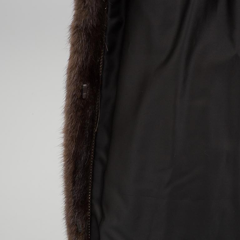 A Mink fur coat from saga Mink, circa size M.