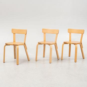 Alvar Aalto, a set of three model 69 chairs, Artek, Finland.