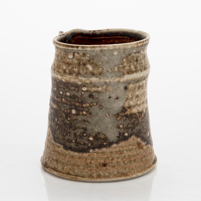 Kyllikki Salmenhaara, a stoneware creamer signed KS Arabia.