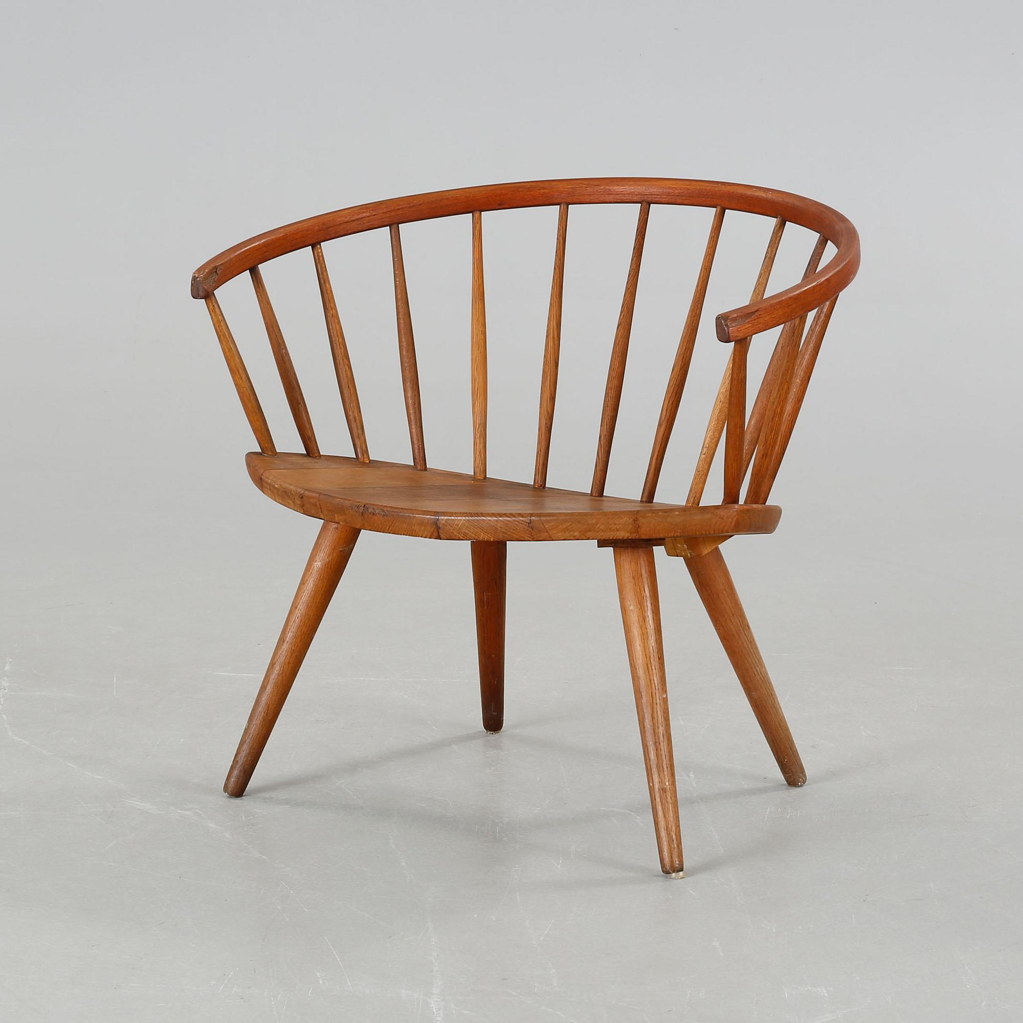 A chair named "Arka", designed Yngve Ekström and made in the third quarter of the 20th century.
