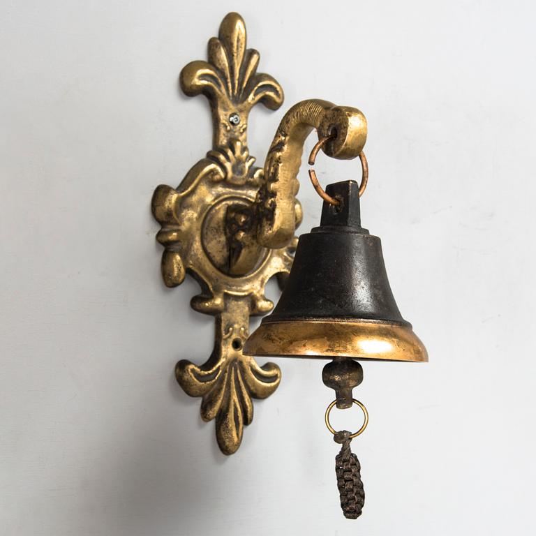 A bronze Ship's Bell mounted on wall bracket, from second half of the 20th century.