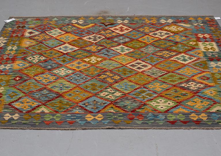 A kilim rug, ca 199 x 201 cm.