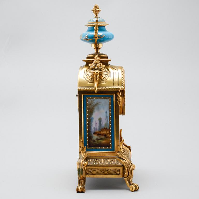 A 19th century mantle piece clock in Louis XVI-style.