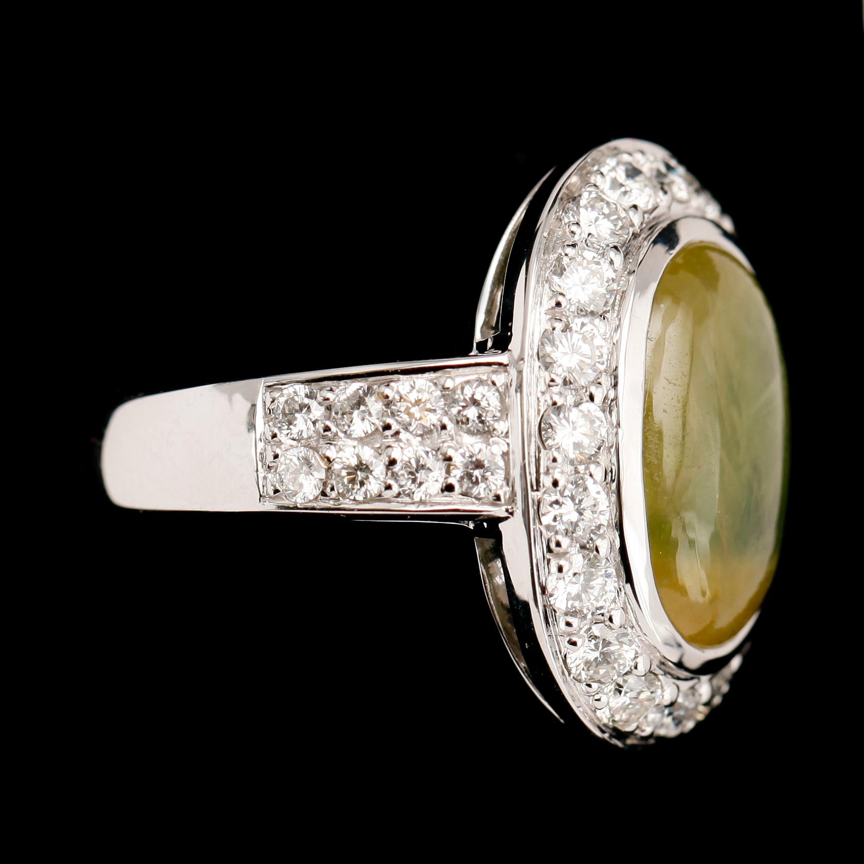 RING, 18 k vitguld, med safir 5.92 ct och briljanter tot 1.04 ct TW.