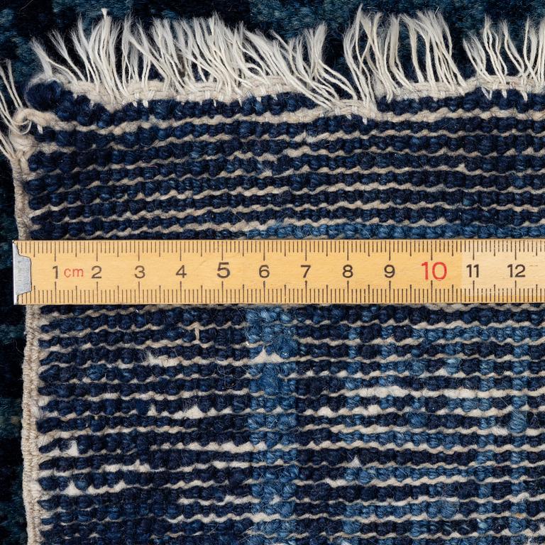 An antique Baotou carpet, north China, c. 257 x 155 cm.