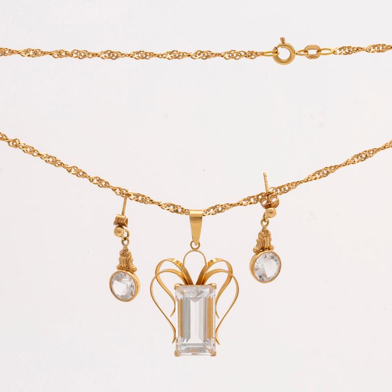PENDANT on CHAIN and EARRINGS, 18K gold and rock crysta (pendant) and spinel (earrings), 1956.