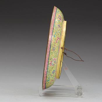 An enamel on copper dish, Qing dynasty 18th century.