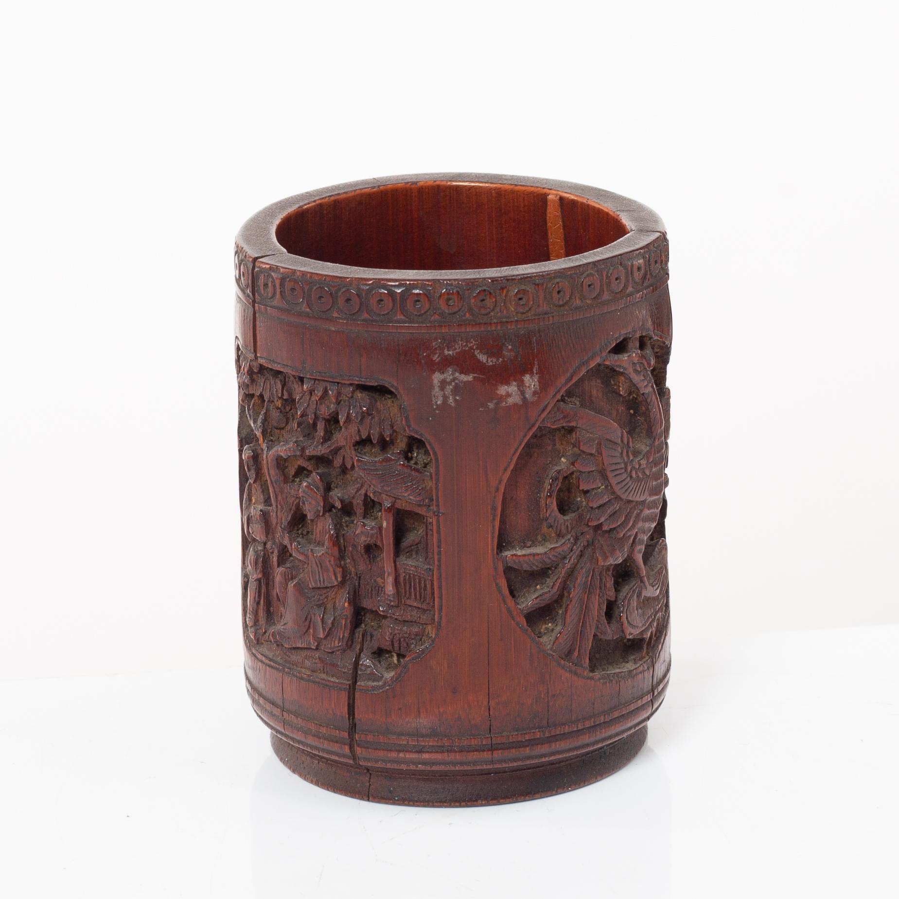 A Chinese bronze vase, joss stick holder and a bamboo brush pot, Qing dynasty.
