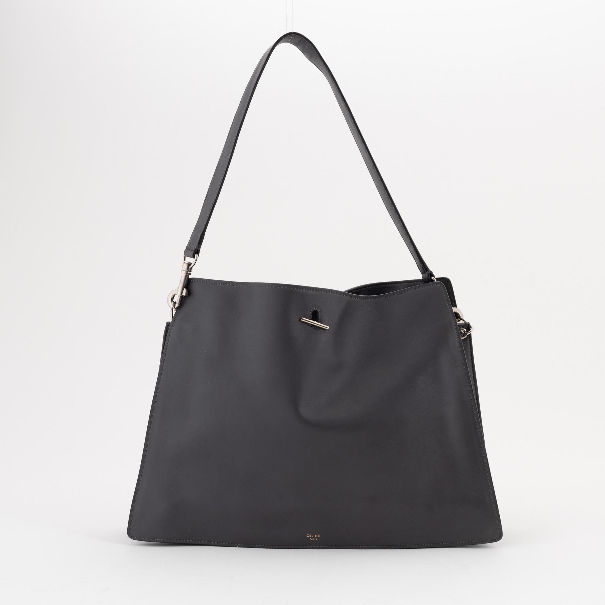 Céline, a grey leather handbag.