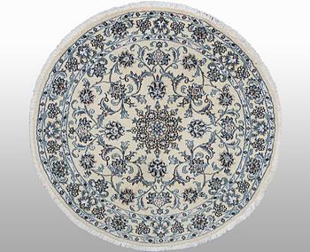 A rug, Nain, part silk, ca 316 x 136 cm.
