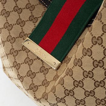 Gucci, GG Supreme bag.