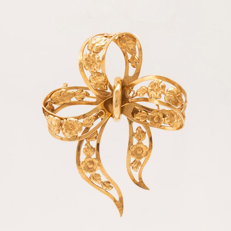 Brosch 18K guld Stockholm 1947.