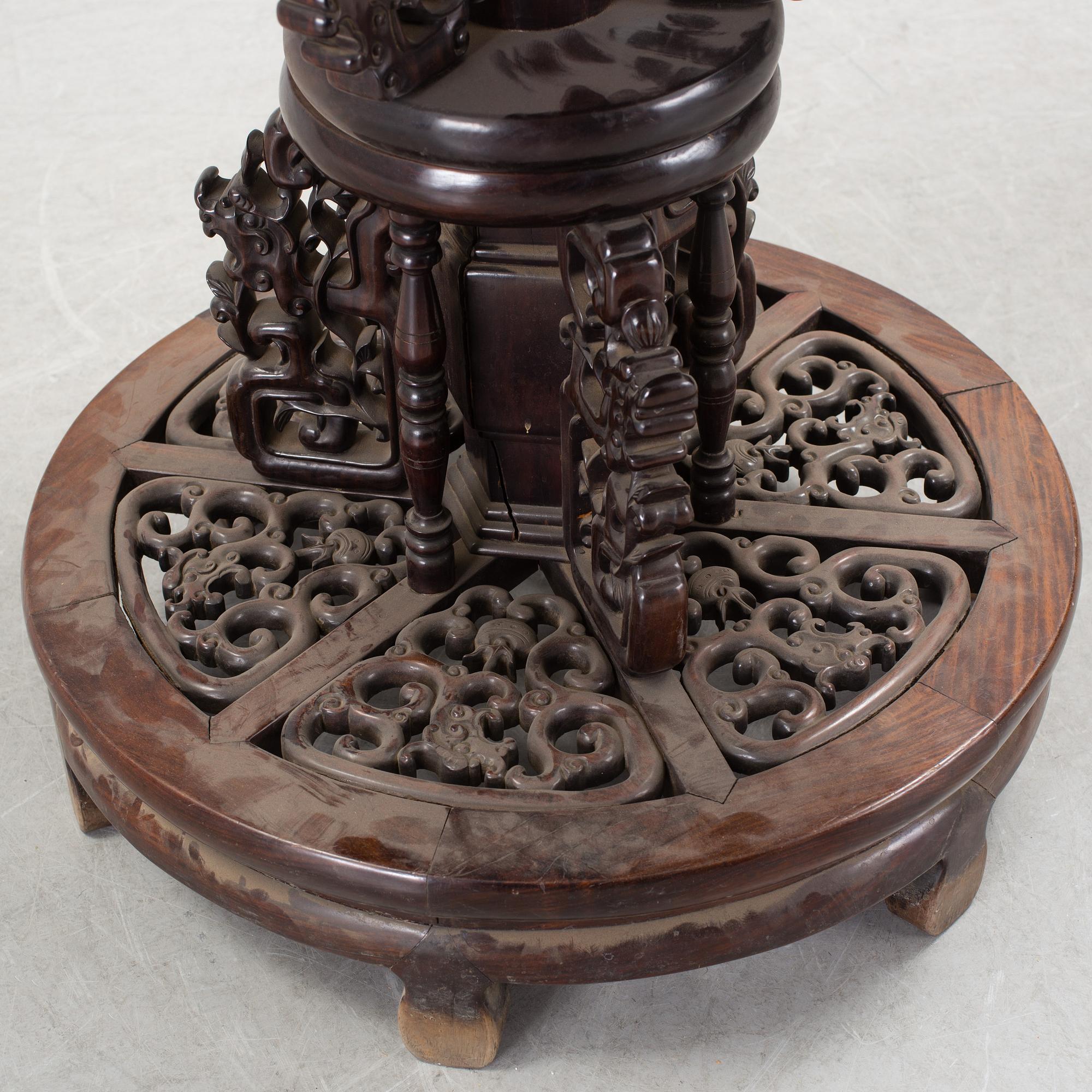 A Chinese wooden table, early 20th century.