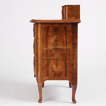 A late Baroque walnut commode by J. H. Fürloh (master in Stockholm 1724-45).