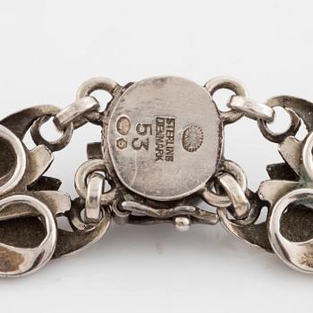 Georg Jensen, a silver bracelet set with cabochon-cut amethysts.