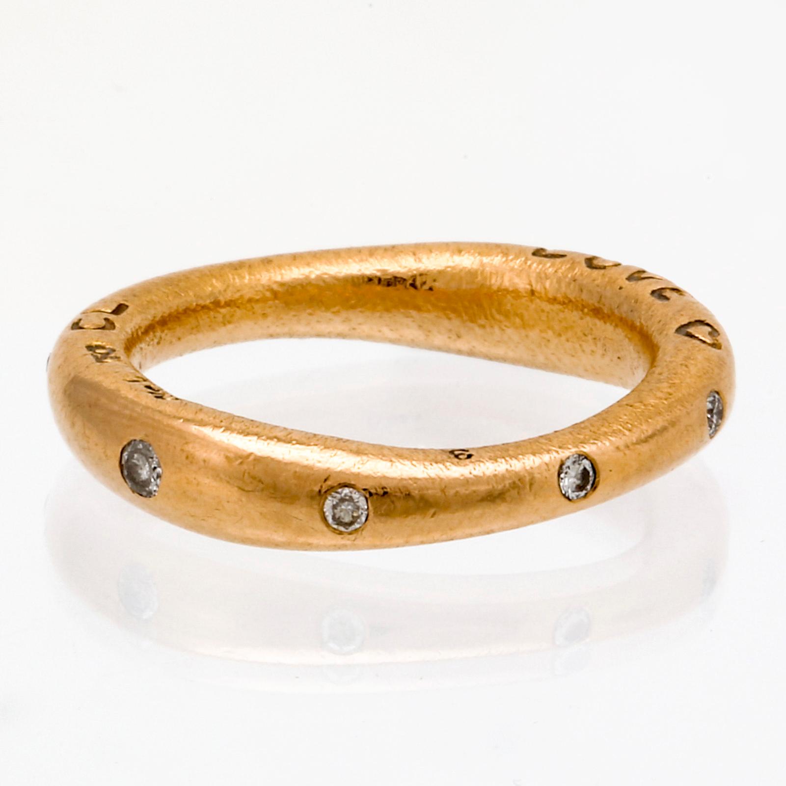 Ole Lynggaard ring 18K gold,  9 brilliant-cut diamonds 0,18 ct in total TW VS.