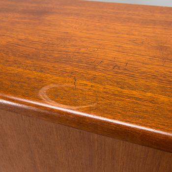 A Danish 1950s-60s cabinet with bar compartment.