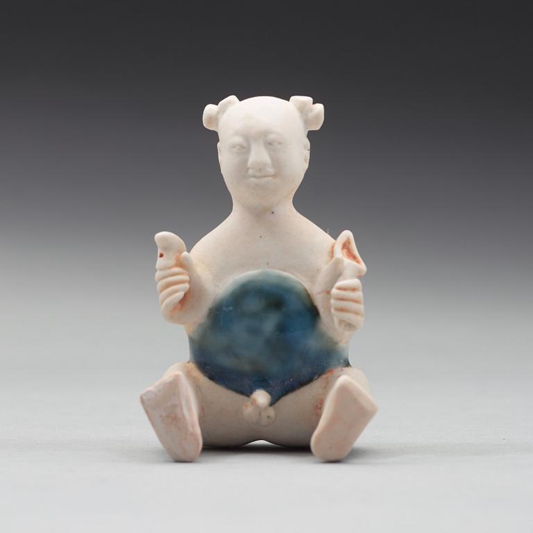 A blue and white procelain figure, Qing dynasty, Qianlong (1736-95).