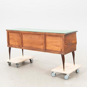 An Italian 1950s walnut sideboard.