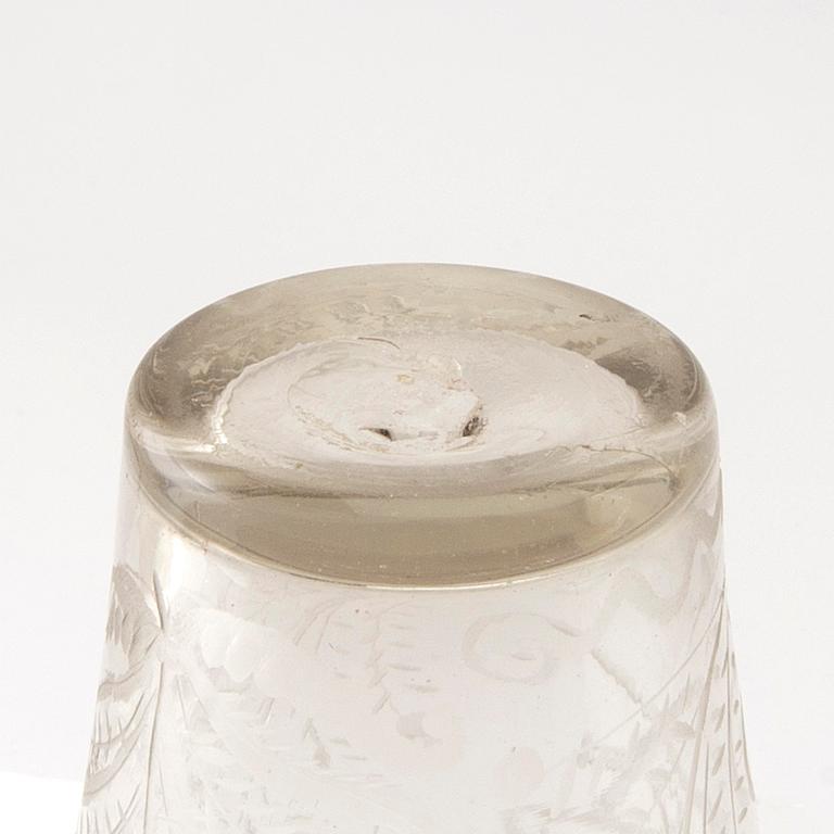 A Swedish glass beaker with the monogram of King Fredrik I, Henrikstorps glass manufactory, early 18th century.