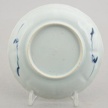 Three (a pair + one) blue and white cups with saucers, China, Kangxi (1662-1722).