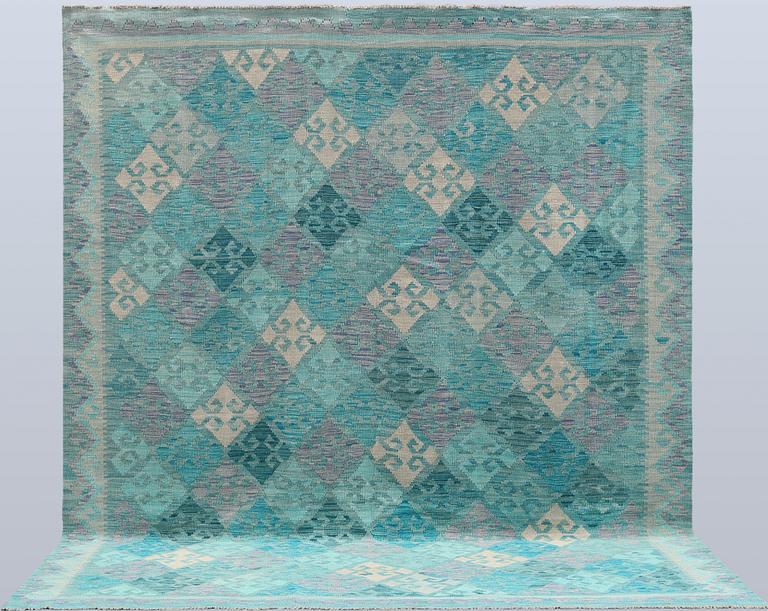 A Kelim carpet, c. 291 x 248 cm.