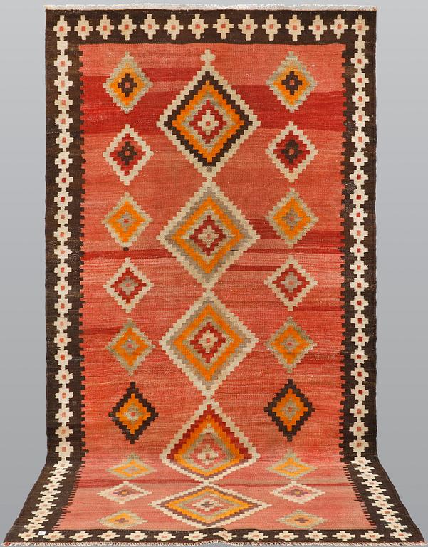 A kurdish nomad kilim, ca 277 x 138 cm.