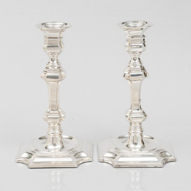 Pedro Duran, a pair of Baroque style sterling silver candle sticks, Spain.