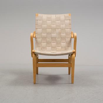 A ' Eva' easy chair by Bruno Mathsson for Firma Karl Mathsson.