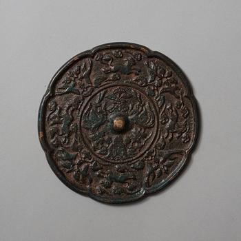 Two bronze mirrors, Six dynasties (220-589) and Tang dynasty (618-907).