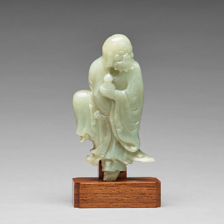 A finely carved nephrite sculpture of an immortal, Qing dynasty, probably Qianlong (1736-95).