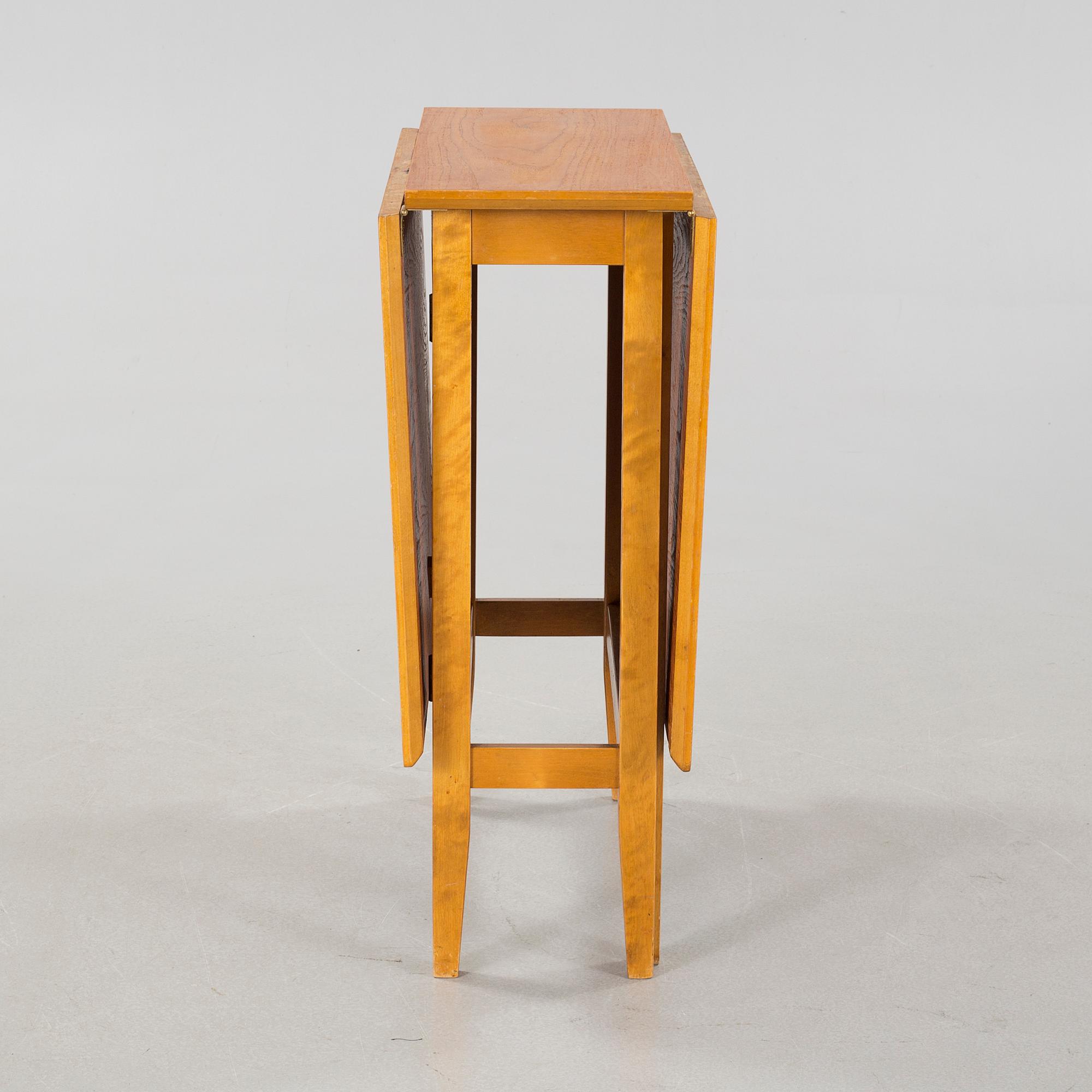 A gate-legged table by Edsbyverken in 1959.