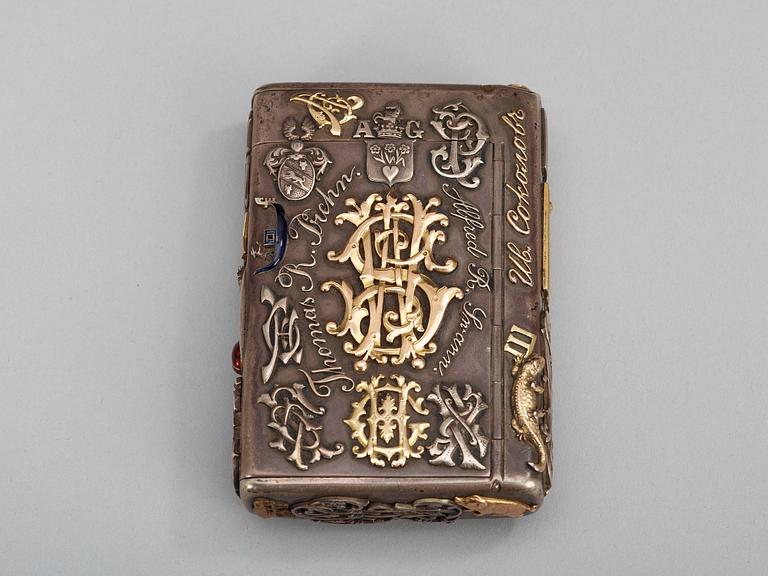 A CIGARRETTE Russian 19th century parcel gilt and enameld cigarette-case, makers mark of Michael Isakov, S.t Petersburg.