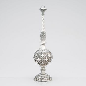 An 1880's british Raj repoussé silver rosewater sprinkler by Oomersi Mawji & Sons.