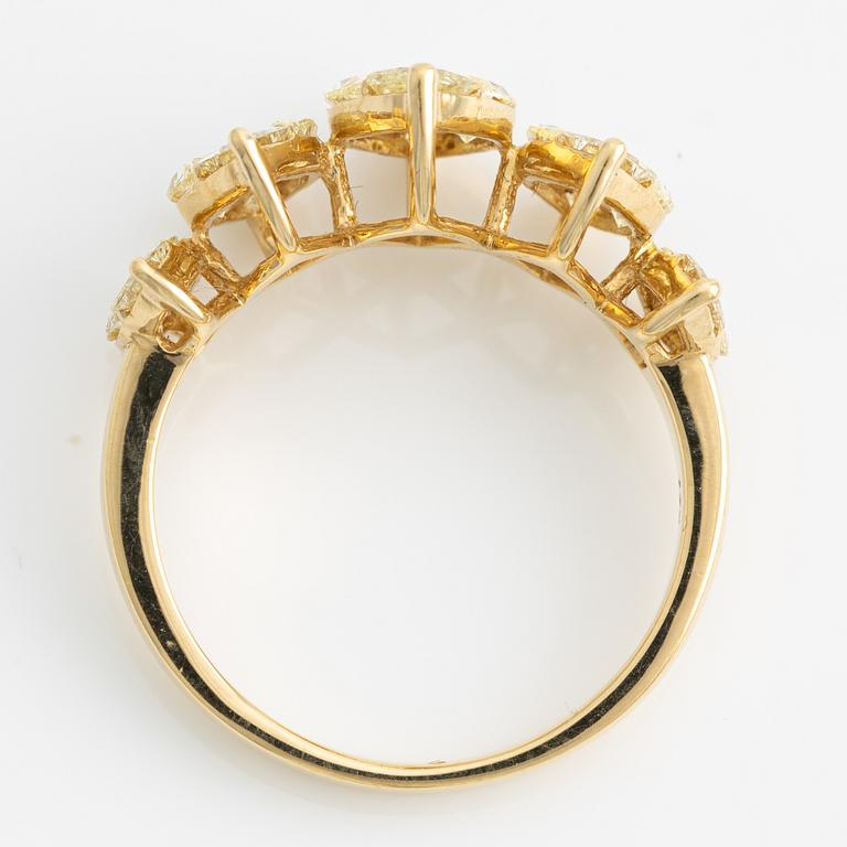 Ring, with yellow oval and princess-cut diamonds.