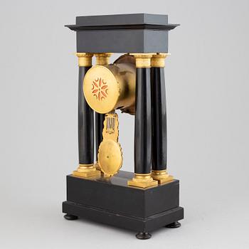 A mid 19th Century mantel clock.