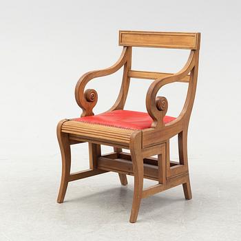 An oak armchair convertible into a library steps/stair, second half of the 20th Century.