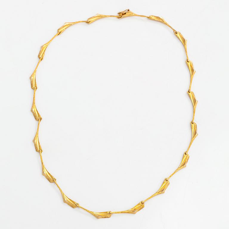 Björn Weckström, A 14K gold necklace "Shadow of a Convoy". Lapponia 1974.