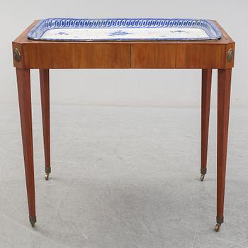 A second half of the 18th century faience tea table.