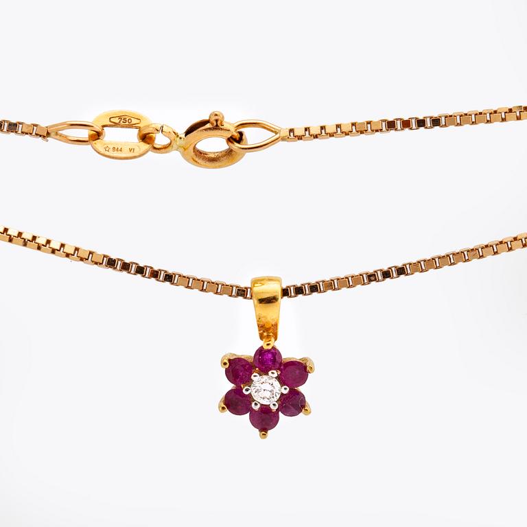 PENDANT and CHAIN 18K gold 1 brilliant-cut diamond and rubies, 4,3 g, length approx 50 cm.