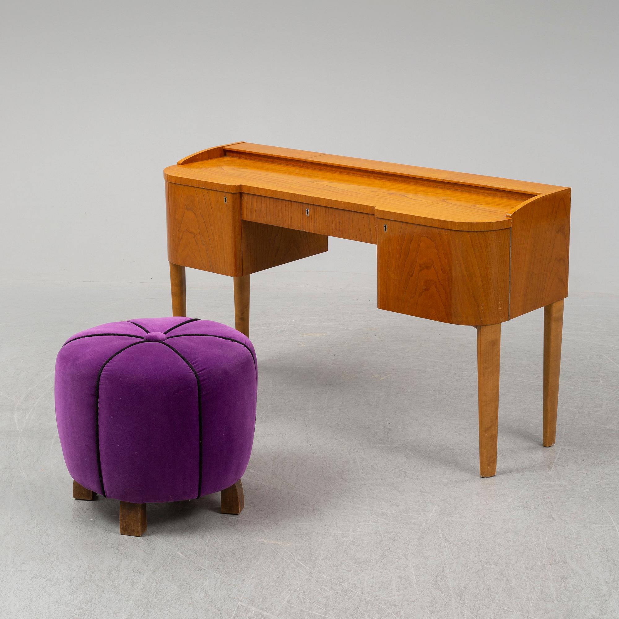 A 1940's table with pouf.