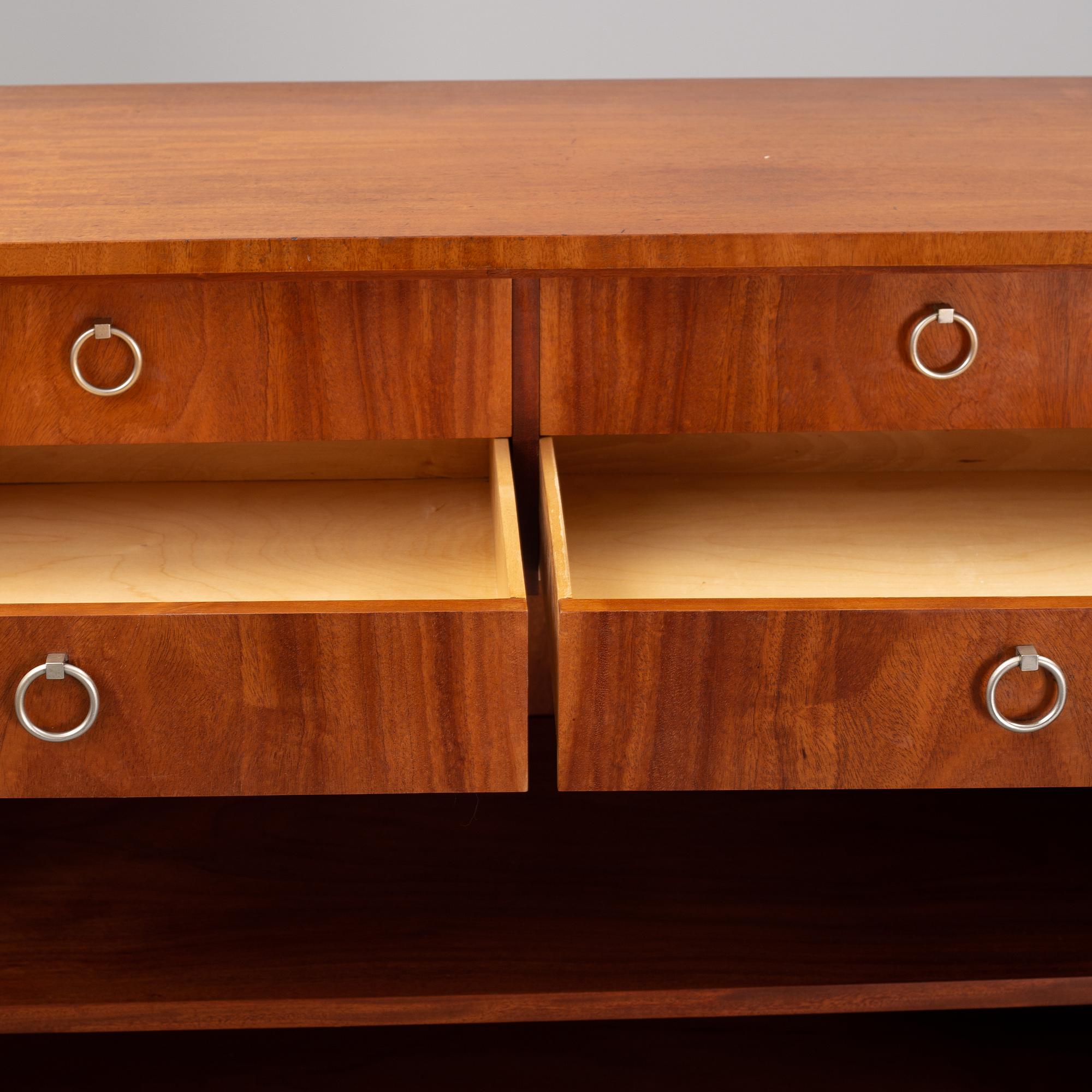 A 1940's Swedish Modern mahogany cabinet from Möbelbolaget.