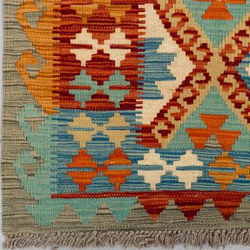 A CARPET, Kilim, ca 242 x 88 cm.