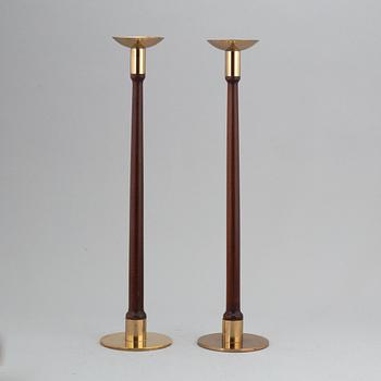 HANS-AGNE JAKOBSSON, a pair of brass and teak candle holders, Markaryd, mid 20th century.
