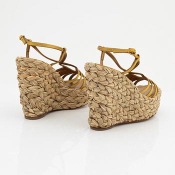 Yves Saint Laurent, a pair of wedge sandals, size 36.