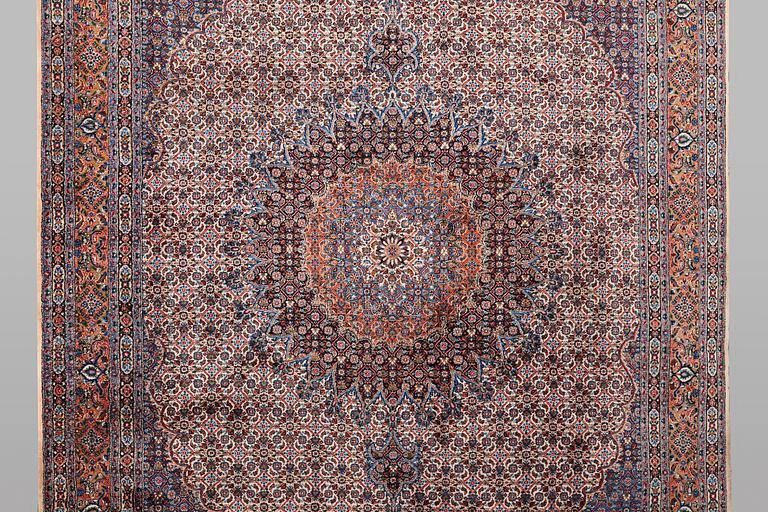 A carpet, Moud, signed, ca 385 x 268 cm.
