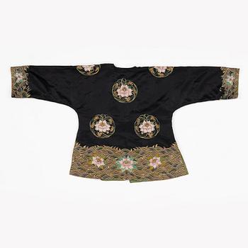 A Chinese embroidered silk robe, height 68 cm, 1920s.