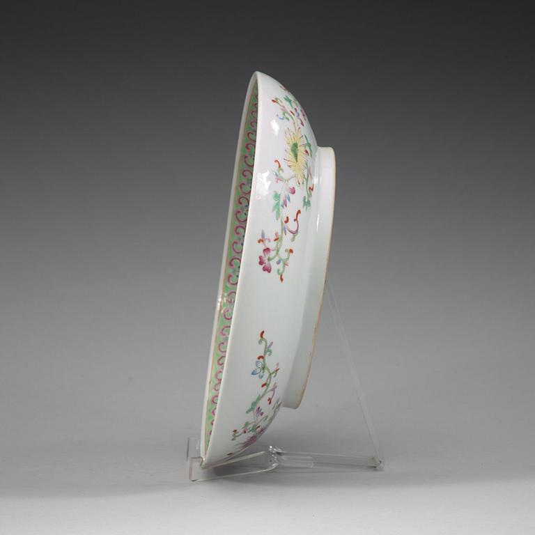 A phoenix and dragon famille rose dish, Qing dynasty, with Guangxu six character mark and period (1875-1908).