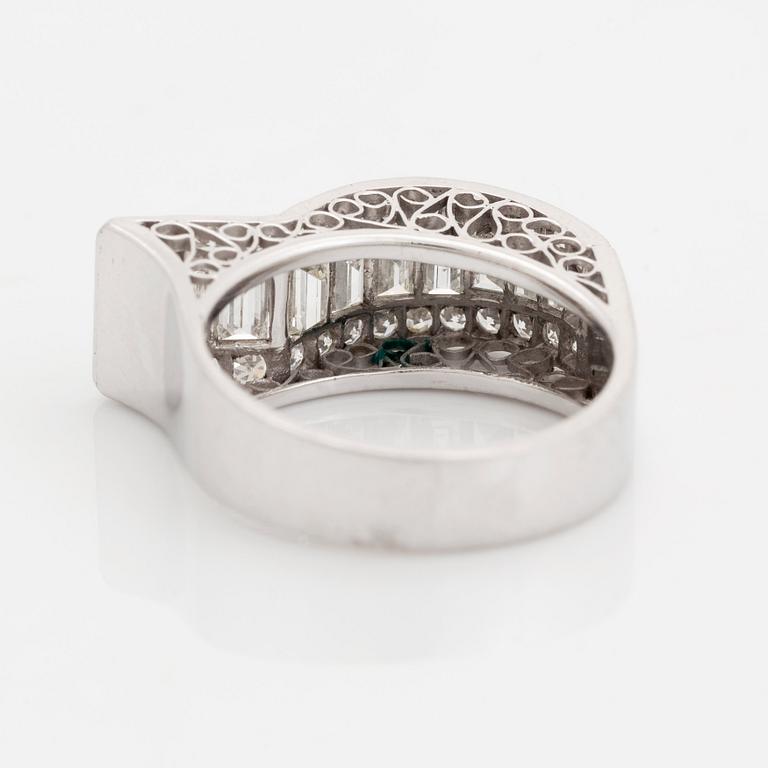 An 18K white gold ring set with baguette- and eight-cut diamonds.