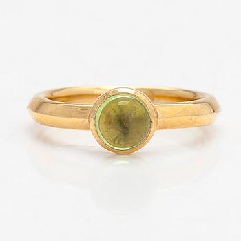 Georg Jensen, an 18K gold 'Moonrise' ring with a cabochon-cut peridot.